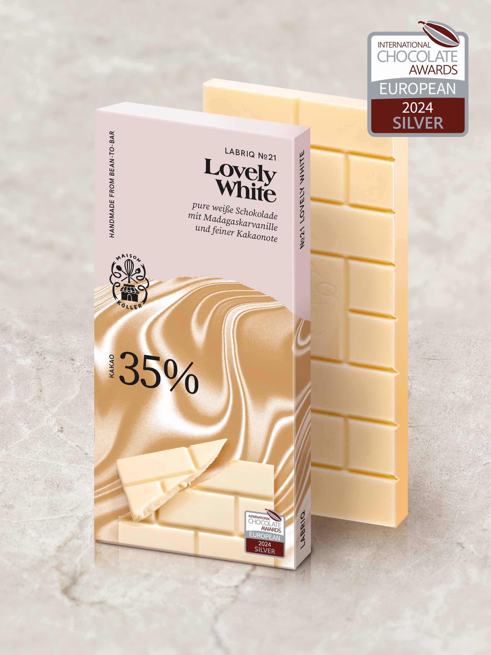 Weiße Schokolade mit Verpackung, Aufschrift "Lovely White 35%" Auszeichnung Silver 2024 von den International Chocolate Awards, European