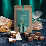 Festliches Motiv mit Weihnachtsstollen, Elisenlebkuchen und Gebäck